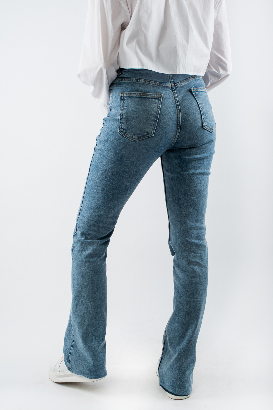 71329 Джинси кльош з середньою посадкою блакитні